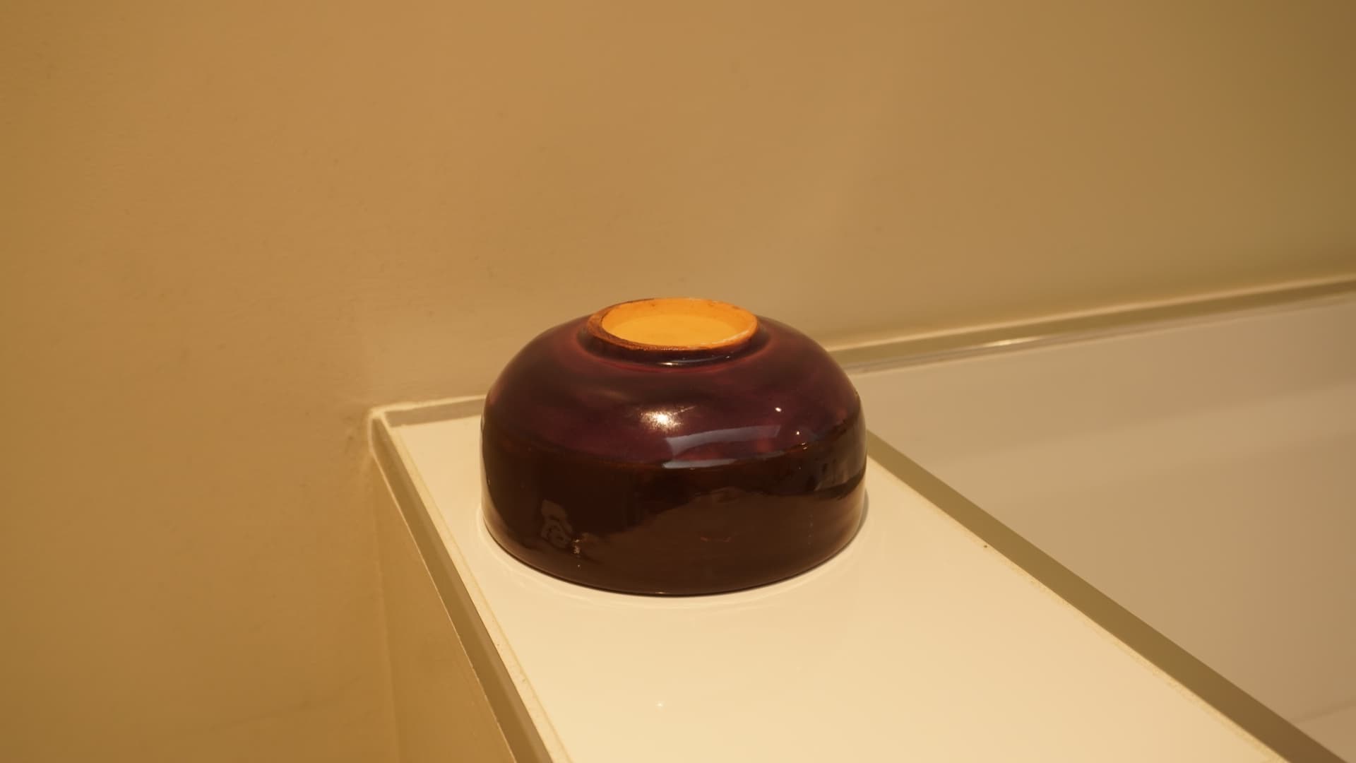 Plum & Petal Bowl · Wheel-thrown · Spectrum 1134 Chocolate + Mayco FN234 Royal Purple, PC602 White Cascade (petal detailing inside) — Ceramic work by RuiXuan Xu — Club