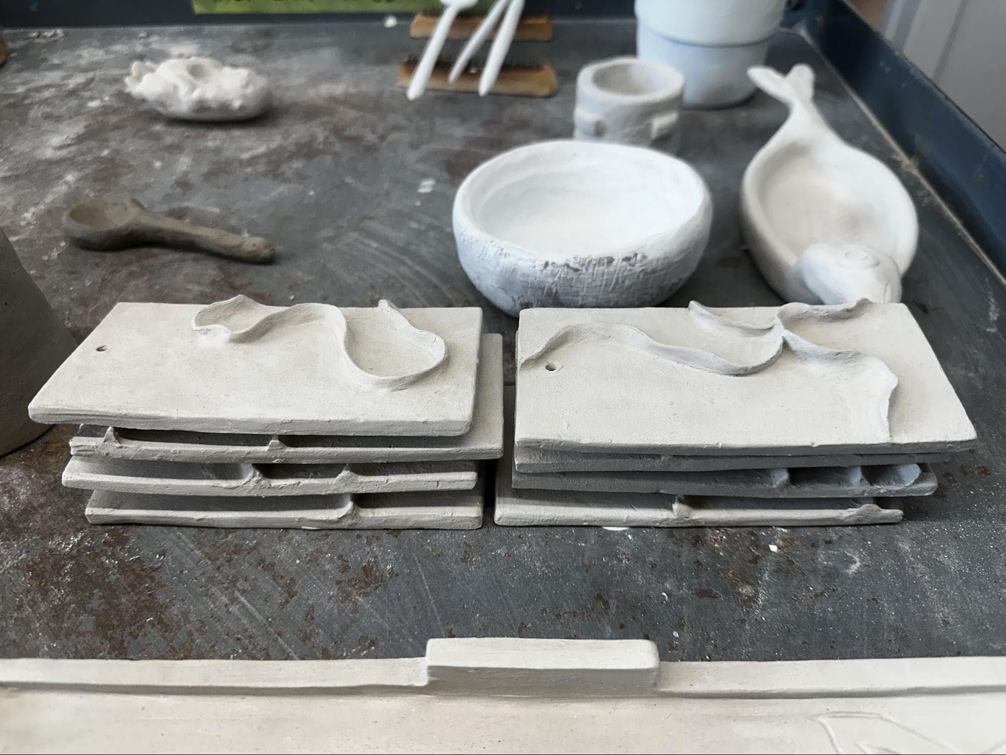 Non-functional Kitchen Tiles · wave design · used an array of blue/gray Mayco glazes — Ceramic work by RuiXuan Xu — School