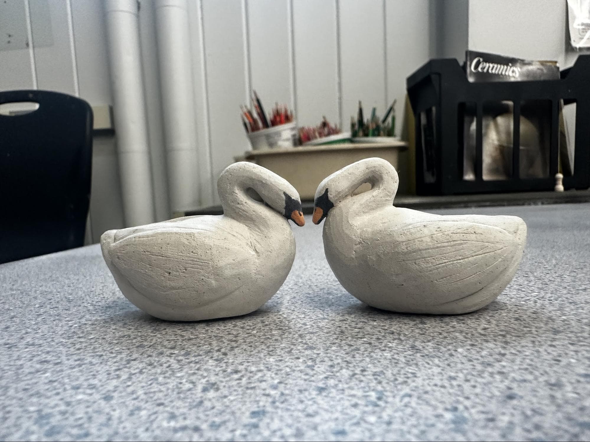 Twin Swans · from sketch to final · Handbuilt (L212) · Underglaze details (Spectrum) — Ceramic work by RuiXuan Xu — School