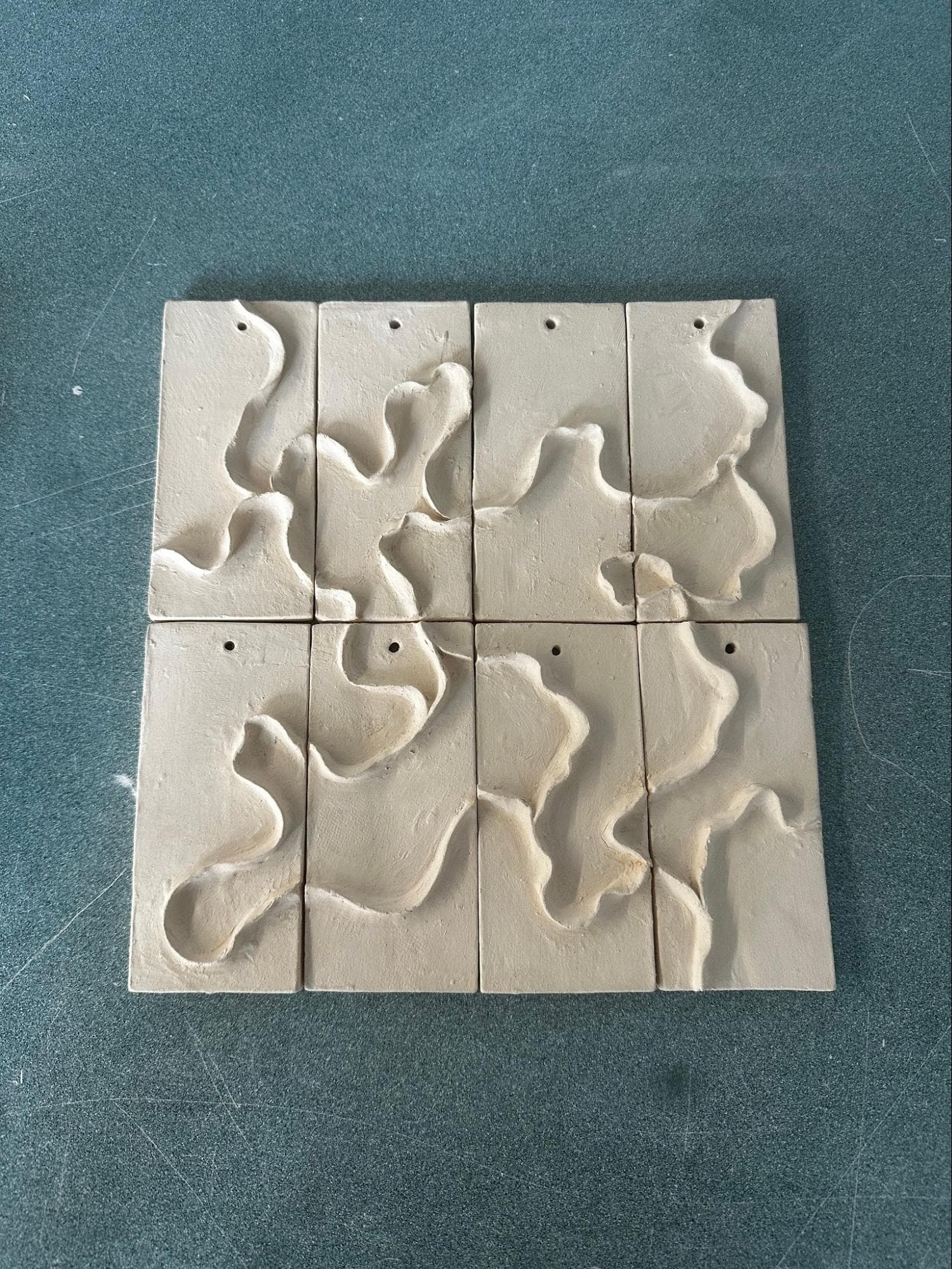 Non-functional Kitchen Tiles · wave design · used an array of blue/gray Mayco glazes — Ceramic work by RuiXuan Xu — School