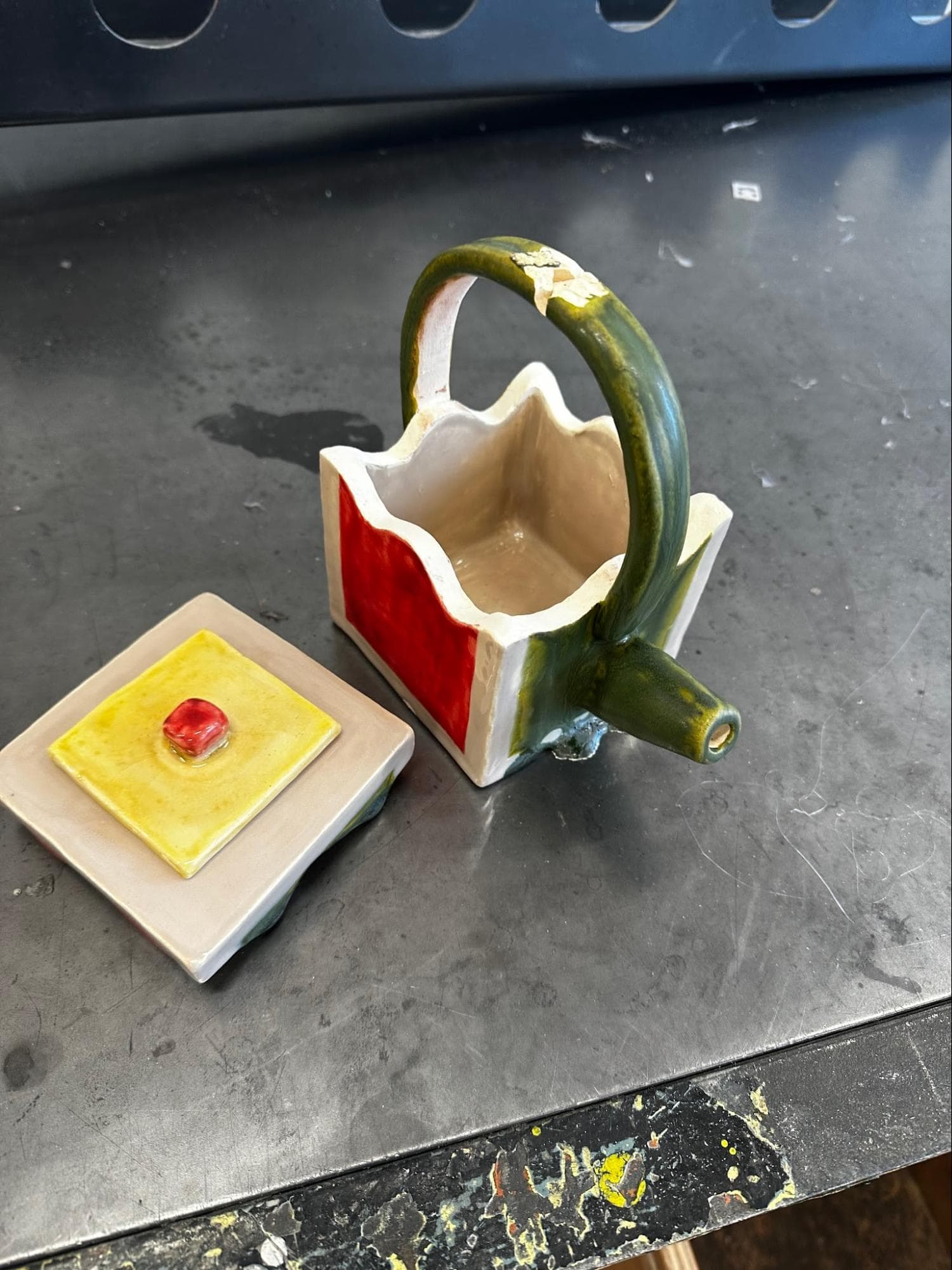 Teapot · unknown Duncan glaze ran and stuck to kiln shelf — Ceramic work by RuiXuan Xu — School